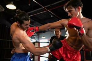 Punching is one of the master techniques of Muay Thai that is used to kick and lift to prevent kicks. which boxers are popularly used as weapons, Muay Thai,Thai martial arts. photo