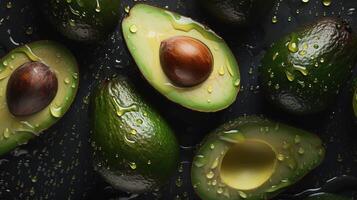 , Macro Fresh Juicy half and whole of green avocado fruit background as pattern. Closeup photo with drops of water