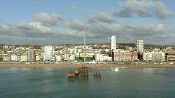 Brighton Beach in the UK with the Remains of the West Pier in the Summer video