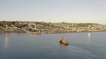 Fishing Boat Returning to Port at Sunrise video