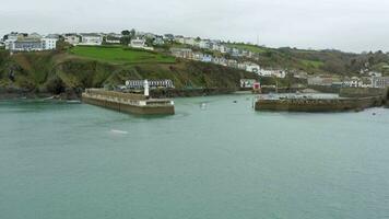 Fishing Boat Departing the Port on a Grey Day Heading Out To Sea video