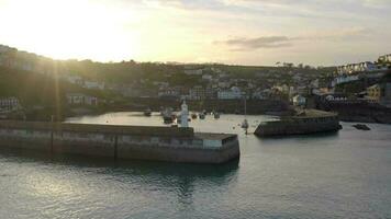 Mevagissey Harbour at Sunset in Cornwall UK video