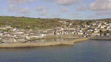 Mousehole Village and Port in Cornwall UK Aerial video