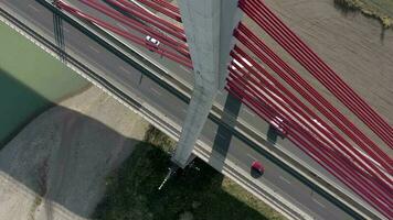 Vehicles Crossing a Cable Stayed Suspension Bridge Crossing a River video