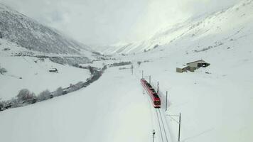 Snow Train in Switzerland Used to Shuttle Passengers and Skiers to Ski Resorts video