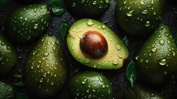 , Macro Fresh Juicy half and whole of green avocado fruit background as pattern. Closeup photo with drops of water