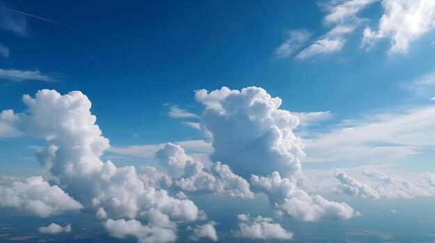 Blue sky with specific clouds. See over the clouds.summer blue sky cloud slant light white establishment. photo