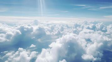 Blue sky with specific clouds. See over the clouds.summer blue sky cloud slant light white establishment. photo