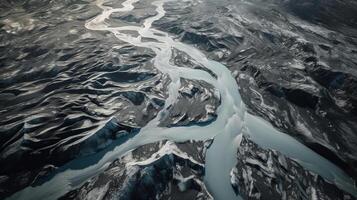 A chilly conduit from over. Ethereal photo of the stream streams from Icelandic chilly masses.