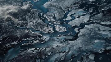 A chilly conduit from over. Ethereal photo of the stream streams from Icelandic chilly masses.