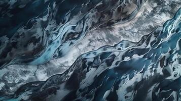 A chilly conduit from over. Ethereal photo of the stream streams from Icelandic chilly masses.