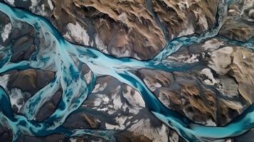 A chilly conduit from over. Ethereal photo of the stream streams from Icelandic chilly masses.