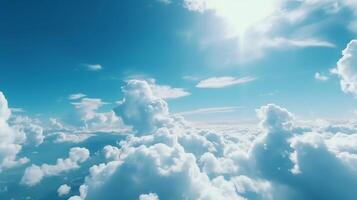 Blue sky with specific clouds. See over the clouds.summer blue sky cloud slant light white establishment. photo