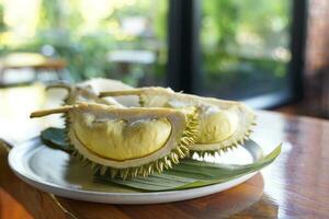 Durian, Longlap-lae variety, has small to medium fruit size.The fruit stalk is small, the peel is thin, the lobe is not clear, the flesh is fine, the taste is sweet, and the smell is mild. photo