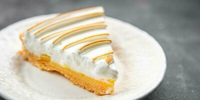 lemon tart meringue sweet pastryndessert meal food snack on the table copy space food background rustic top view photo