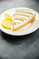 lemon tart meringue sweet pastryndessert meal food snack on the table copy space food background rustic top view photo