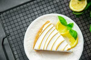 lemon tart meringue sweet pastryndessert meal food snack on the table copy space food background rustic top view photo