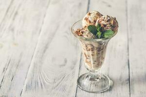 Vanilla-chocolate ice cream in a sundae glass photo