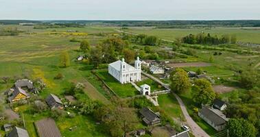 aerial view on old white temple or catholic church in countryside video