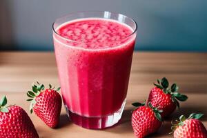 Fresh strawberry smoothie in a glass on a wooden table., closeup. Healthy food concept. photo