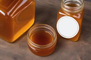 Honey in a glass jar on a wooden background. Selective focus. healthy food concept. photo