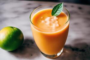 Glass of fresh mango juice on wooden table, closeup. Healthy food concept. photo