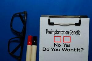 Preimplantation Genetic, Do You Want it Yes or No. On office desk background photo