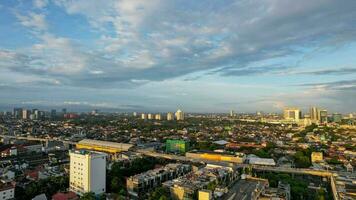 Aerial view of Jakarta Central Business District shot from a drone at sunrise. Jakarta, Indonesia, March 2, 2022 photo