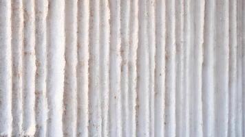 White concrete wall texture. Close-up of white concrete wall texture background. photo