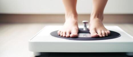 women feet on the weight scales photo