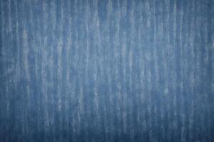 Grunge blue background with space for your text or image. Blue jeans background. photo