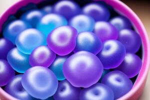 close up of Colorful jelly candies on a wooden background, sweet food. Colorful candies on a dark background. photo