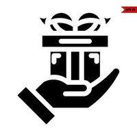 gift box in hand glyph icon vector