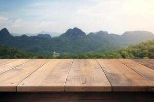 Empty wooden table with blurred mountain landscape background. photo