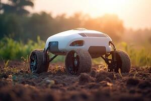 Unmanned robot working in agricultural field. photo
