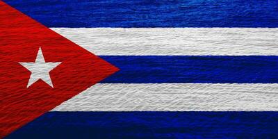 Flag of Cuba on a textured background. Concept collage. photo