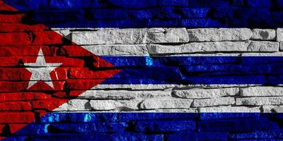 Flag of Cuba on a textured background. Concept collage. photo