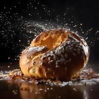 Bun sprinkled with sesame seeds and splashes of water on a black background, Image photo