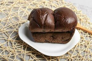 Chocolate bread in a white plate photo