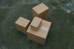 Photo of a pile of brown cardboard boxes