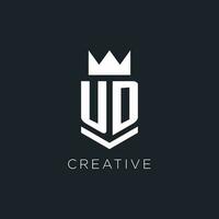 UD logo with shield and crown, initial monogram logo design vector