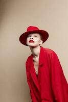pretty woman red lips fashion jacket cosmetics isolated background photo