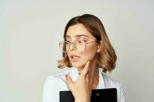 woman in white shirt documents office official success photo