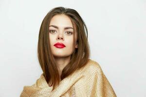 A girl in a golden scarf Look forward model glamor fashionable style photo