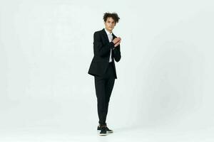 business man in suit modern style posing isolated background photo
