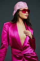 beautiful woman posing pink mini dress charm headscarf sunglasses studio model photo