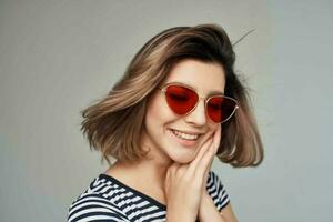 woman in striped t-shirt sunglasses Red skirt fashion photo