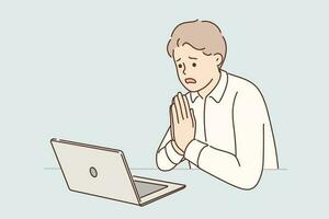 Man manager prays sitting at table with laptop asking god for help after making mistakes in project. Guy office worker prays talking with partner on video link forgiveness for breach of agreements vector