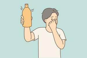 Man covers nose holding in hand bottle of drink or milk that has expired and begun to ferment. Young guy smells stench coming from bottle of gel with unpleasant flavor or toxic aroma vector