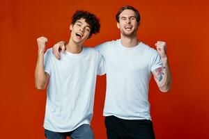 Two cheerful friends in white t-shirts communication photo